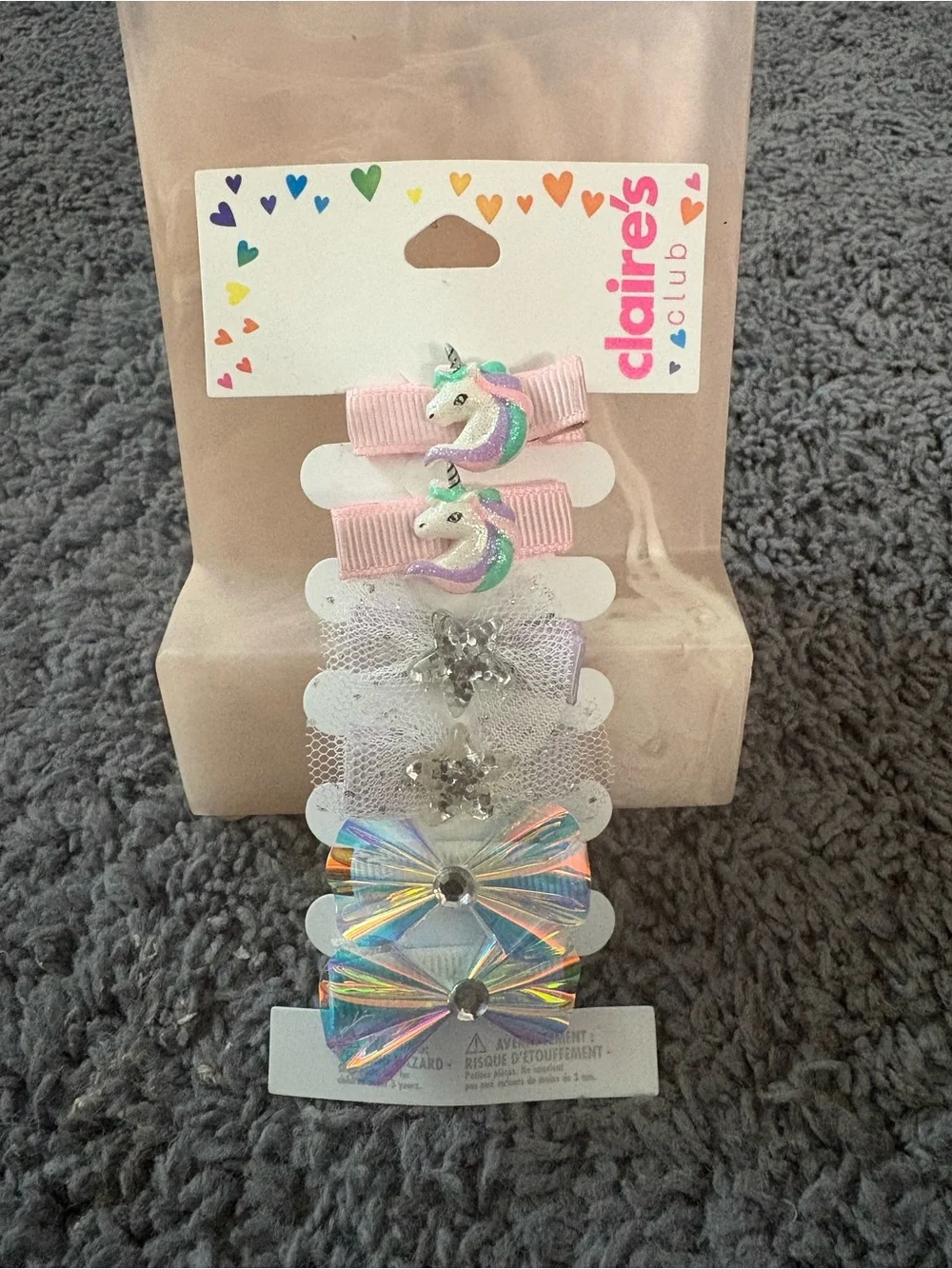 NWT set of 6 hair clips - 2 unicorns, 2 sparkly stars, and 2 iridescent bows